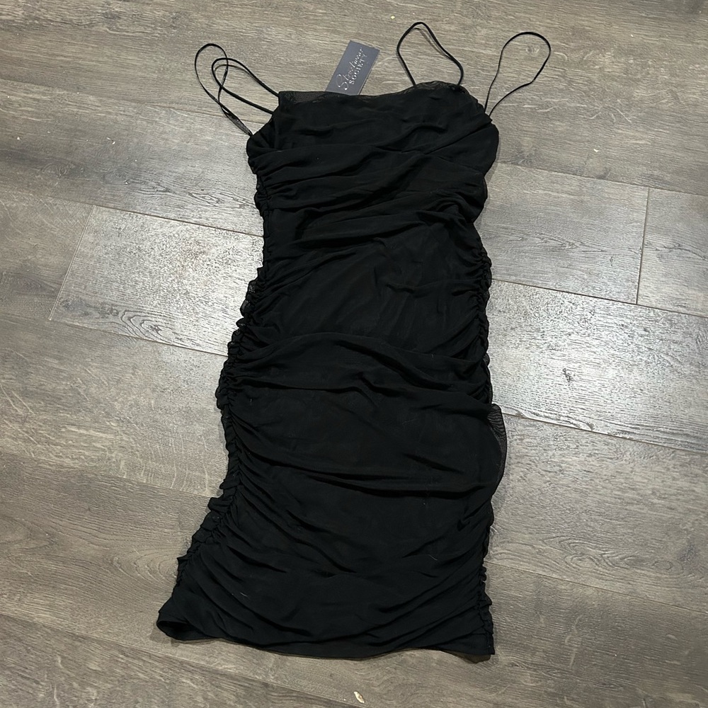 Black tight mini dress never worn